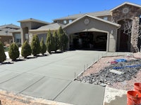a driveway is being built in front of a house